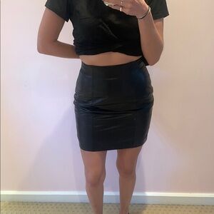 Tannery West Black genuine leather high waisted mini skirt lined. Size 4